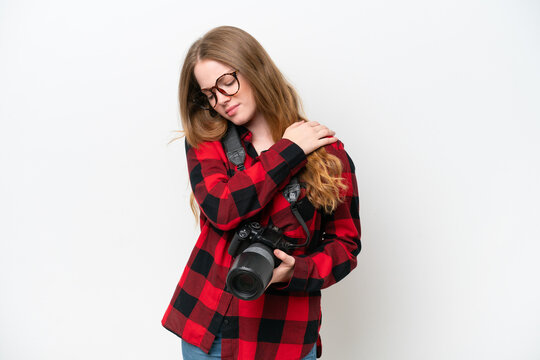 Young photographer pretty woman isolated on white background suffering from pain in shoulder for having made an effort