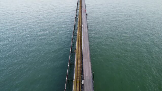 Scenic drone (aerial) footage of Southend-on-Sea pier on a summer day.