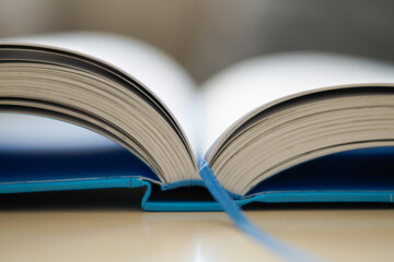 open book with pages in the background