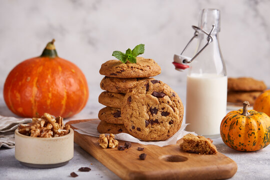 Cookies with pumpkin, walnuts and dark chocolate. Delicious homemade dessert.