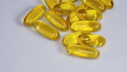 Vitamin E Capsules On White Background