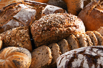 Assorted bakery products including loafs of bread and rolls