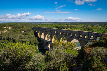 Fototapeta na wymiar Roman aqueduct Pont du Gard and natural park in Languedoc, France