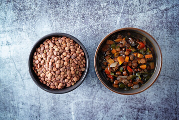 Green Lentil carrots red pepper vegan soup in a bowl