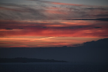 pink, orange, red sunset sunrise sky over mountains hill horizon