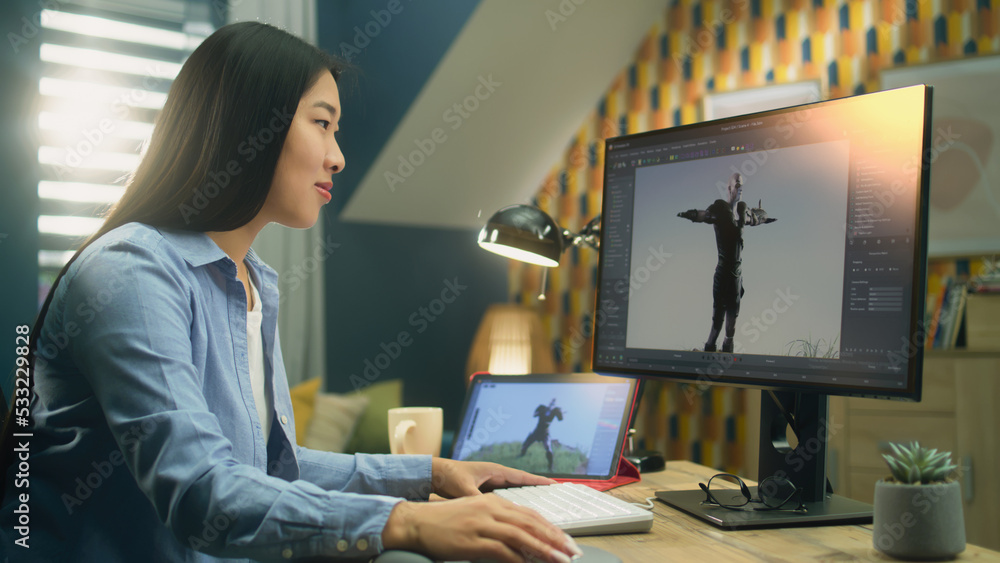Poster Asian female 3D designer making animation for video game character using modern computer and tablet and software for creating 3D modeling projects