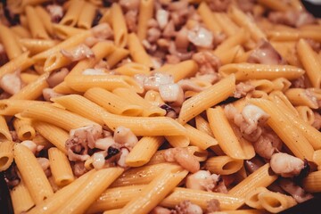 detail of Italian pasta cooked with seafood during a surf and travel week experience in Somo, Cantabria (Spain)