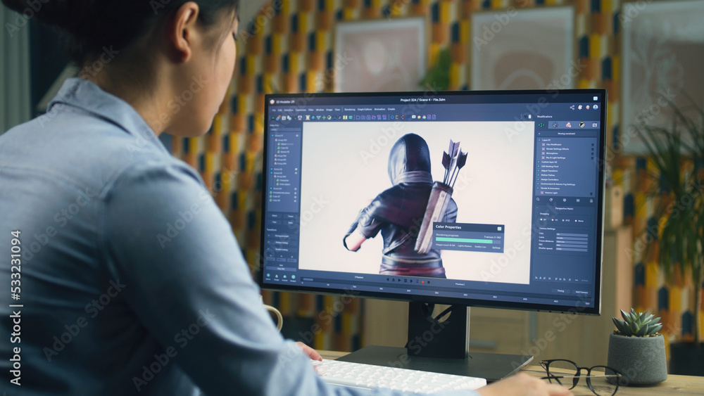 Poster female 3d designer creating and drawing character for video game using computer while sitting at the