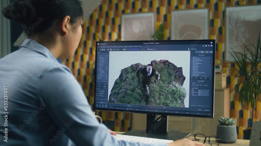 Poster Asian female 3D designer making animation for video game character using modern computer with software for creating 3D modeling projects