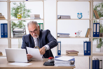 Old male employee and too much work in the office