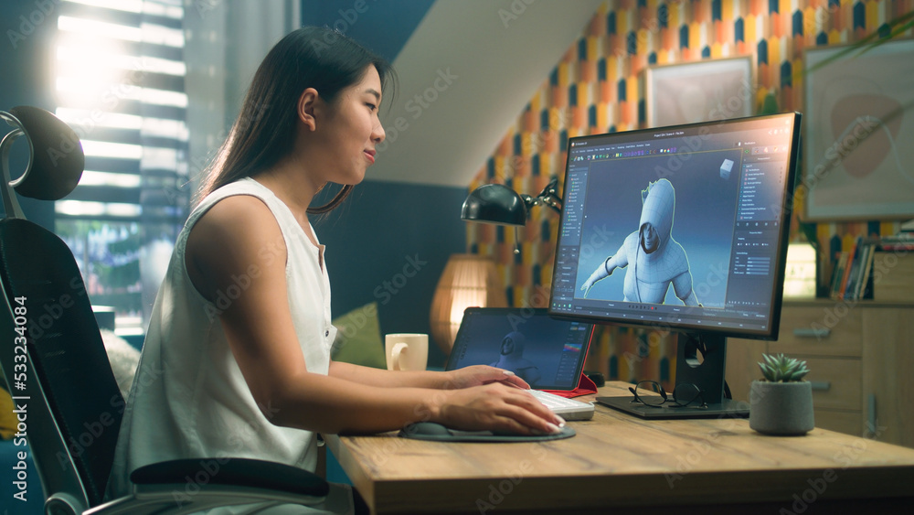 Poster asian woman creating 3d model of video game character in professional program using computer and dig