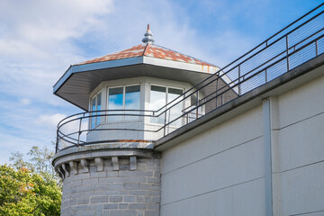 Clouds reflect in the windows of a prison's guard tower in Kingston Ontario Canada.