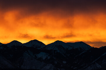 Silhouette Of La Sal Mountains With Glowing Orange Sky