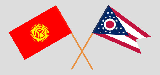 Crossed flags of Kyrgyzstan and the State of Ohio. Official colors. Correct proportion