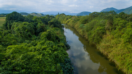 Fototapeta na wymiar Aerial view of Macacu River, one of the rivers that flows into Guanabara Bay, the postcard of Rio de Janeiro.