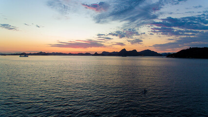 Aerial view of Guanabara Bay at dawn, one of Rio de Janeiro's postcards. In the background the mountains of the state.