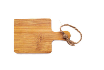 wooden cutting board on white background. Texture, reading space.