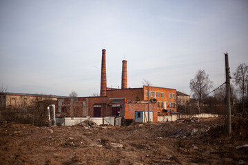 Brick factory. The old factory. Industrial landscape. Brick pipes. Industrial processing area.