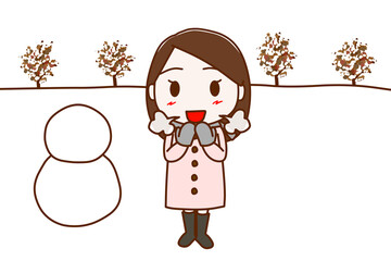 （全身正面）雪が積もったので雪だるまを作って冬を楽しむ女性