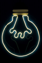 Neon light with the shape of traditional light bulb, isolated on dark and black background. Selective Focus, intentional blur.