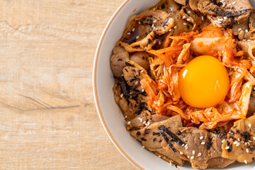 pork bulgogi rice bowl with kimchi and Korean pickled egg