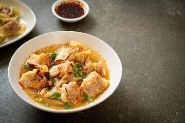 pork wonton soup or pork dumplings soup with roasted chili