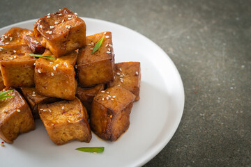 fried tofu with white sesame and teriyaki sauce