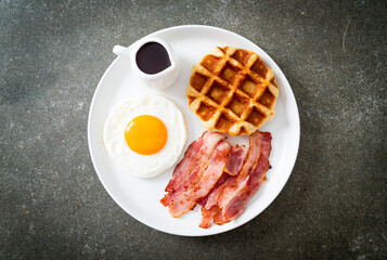 fried egg with bacon and waffle