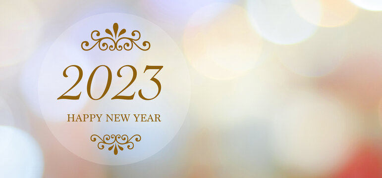 Happy New Year 2023 on blur abstract bokeh background, new year greeting card, banner