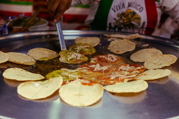 Preparation of chalupas poblanas, Mexican food Puebla Mexico