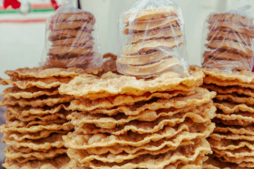 Homemade fritters for sale at a street food stall
