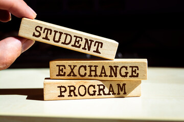 Wooden blocks with words 'Student Exchange Program'.
