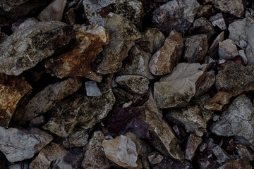 top down view of weathered sharp edged rough river rock