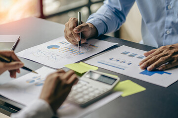 business team meeting The new generations work together to present and brainstorm ideas on financial analytics and business marketing strategy projects.