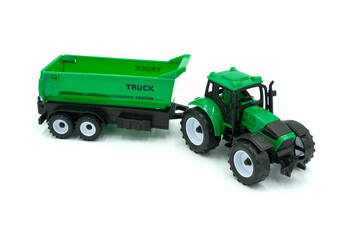 Toy colurfull tractor isolated on white background.