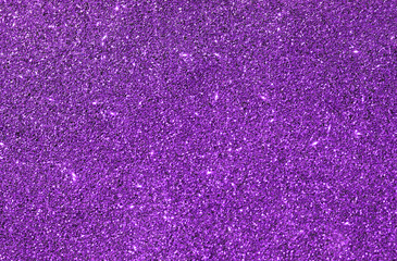 Purple glitter light background.  Photo can be used for New Year, Christmas and all celebrations backgrounds concepts.