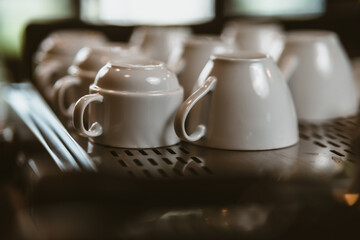 coffee cup on coffee machine at coffee shop.