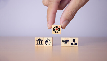 business strategy, action plan, objectives, pile on table with icons about business strategy and action plan copy space