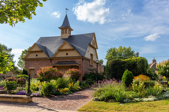 Daytime exterior view of the historic Rensselaer D. Hubbard Carriage House and public garden on September 17, 2022 in Mankato, Minnesota, USA