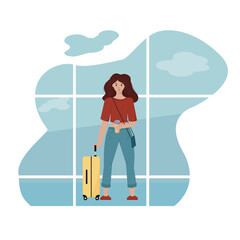 A young woman with a suitcase goes on vacation.