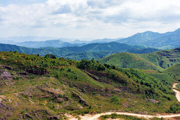 Fototapeta premium Beautiful landscape of Noen Chang Suek (Battle Elephant Hill) mountain view point is Thailand and Myanmar border crossing point. Mountain hill road view point scenic west in Kanchanaburi Thailand.