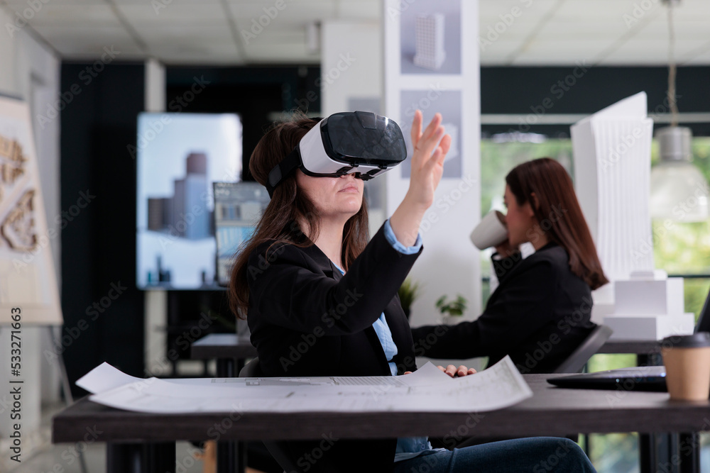 Aufkleber architect in vr headset touching virtual building model, working on project in metaverse. employee e