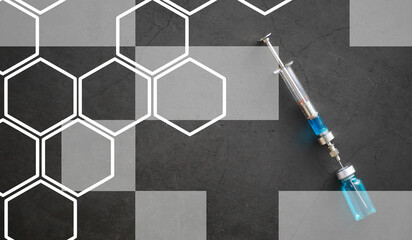 small jars with injection and syringe for injection on a blue background near the chemical formula