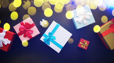 Christmas decoration. Gift boxes on black stone  background. Christmas greeting card concept.