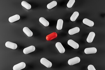 Red pill between white pills on black background 3d render.