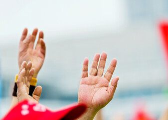 hands raised