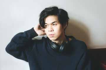 Headshot portrait of young adult asian men in japanese look with black short hair