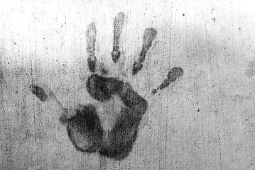 Main imprimée sur un mur