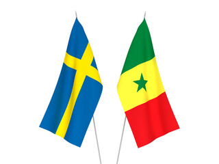 National fabric flags of Sweden and Republic of Senegal isolated on white background. 3d rendering illustration.