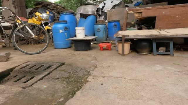 Drinking water filled in blue containers in slum area